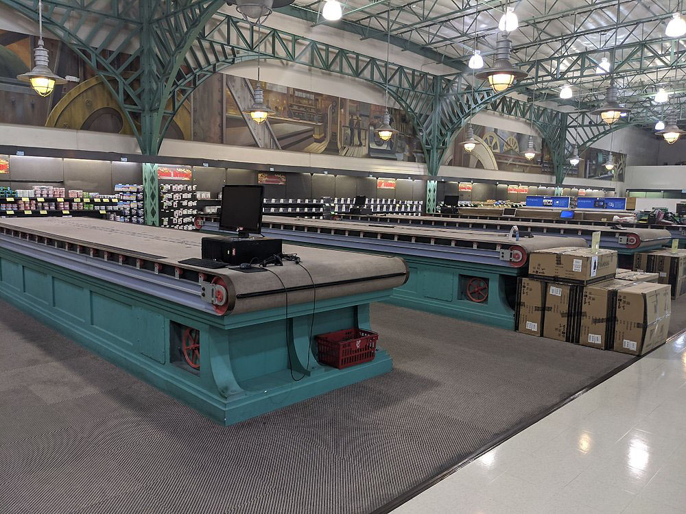 Conveyor belt display tables