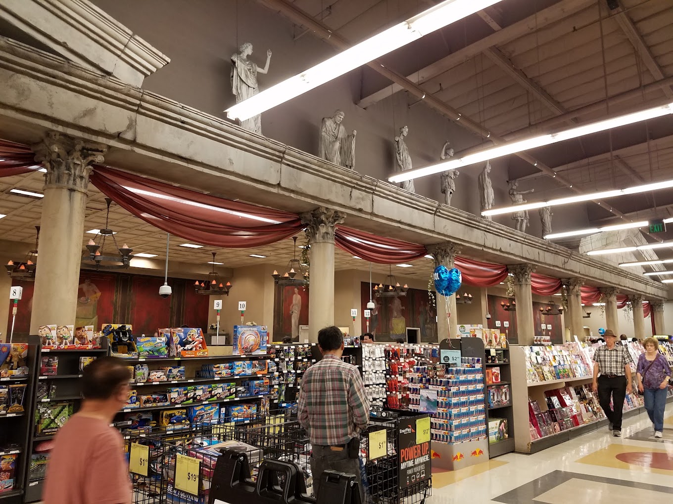 Smaller statuary above checkout line
