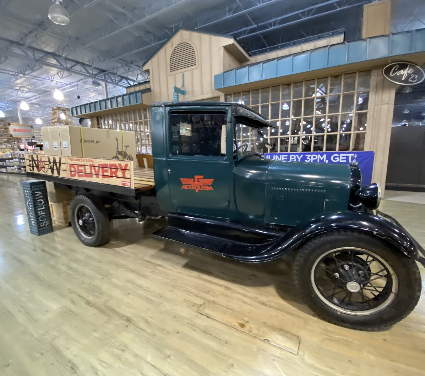 Truck in front of cafe
